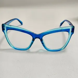 Montura de gafas de ojo de gato azul translúcido, gafas vintage elegantes para mujer.