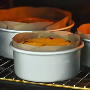 Papier cuisson résistant à la température anti-adhésif pour moule à gâteau four et pâtisserie