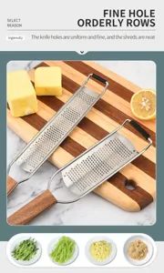 Stainless steel kitchen grater with wooden handle for cheese lemon and vegetables.