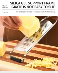 Stainless steel cheese grater with silicone support frame for kitchen food shredding.