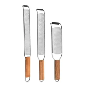 Stainless steel kitchen grater with wooden handle, multi-functional cheese and lemon zester tool.