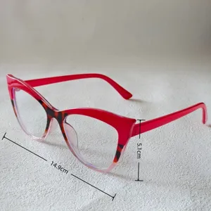 Chic cat eye blue light blocking glasses with striking red and leopard print frame.
