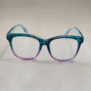 Occhiali da vista quadrati anti luce blu alla moda, montatura sfumata dopamina.