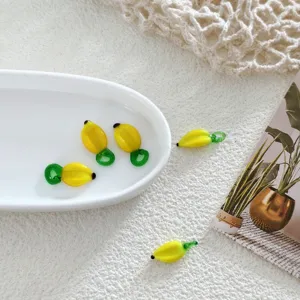 Handmade glass banana charms for DIY jewelry making, cute yellow fruit pendants for earrings.