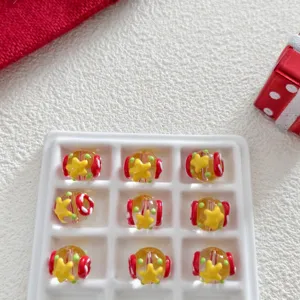 Christmas glass beads DIY handmade jewelry accessories with cute stars and festive red details.