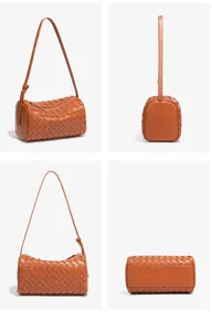 Detailansichten der braunen geflochtenen Leder Zylindertasche, stilvolles Alltagsaccessoire.