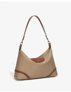 Klassische Nylon Hobo Umhängetasche mit braunem Lederdeckel für den täglichen Gebrauch.