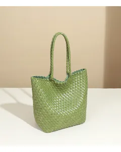 Green woven leather tote bag, stylish large capacity casual shoulder handbag for daily commute.