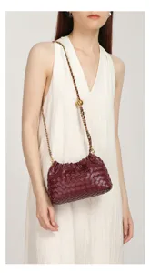 Detailed view of the women woven leather chain shoulder bag, stylish quilted design, burgundy.