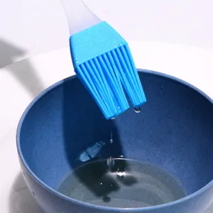 Silicone basting brush for barbecue, baking, pastry, and oil brushing in kitchen.