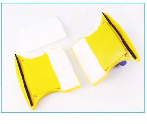Detailed view of yellow double-sided magnetic glass cleaner parts and replacement pads.