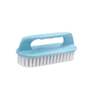 Cepillo de limpieza doméstico multifuncional con cerdas suaves y mango para ropa y zapatos.
