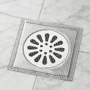Disposable floor drain hair catcher mesh filter for bathroom shower and sink anti clogging.