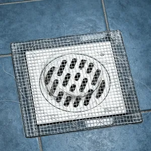 Disposable shower drain mesh sticker, hair catcher filter for bathroom floor and kitchen sink.