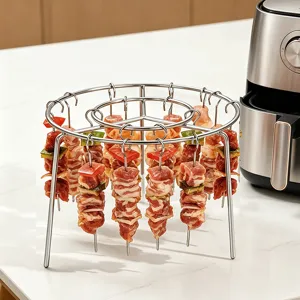 Stainless steel vertical skewer rack detail for air fryer, hanging BBQ grill tool.