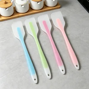Set of four colorful silicone spatulas for baking, cake scraping, and cream spreading.