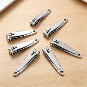 Stainless steel nail clipper set with smooth surface design for home personal care use.