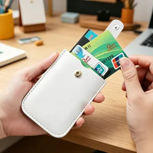 White PU leather card holder detail, multi-slot slim wallet with snap button and pull tab.