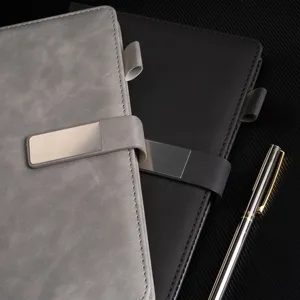 A5 business notebook with soft PU leather cover, metal buckle and pen holder, elegant style.