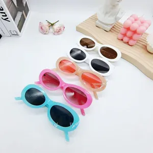 Retro oval sunglasses for women, trendy colorful frames with UV protection for summer fashion.
