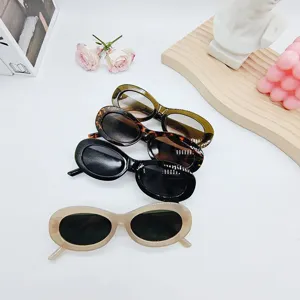 Chic oval frame sunglasses set featuring stylish colors like black, tortoise, and beige.