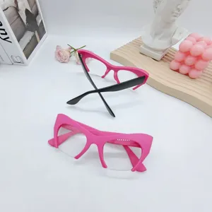 Fashionable cat eye half frame glasses with pink frame and black temples for women stylish everyday wear.