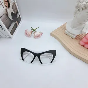 Stylish half-frame cat-eye blue light blocking glasses with trendy black and white design.