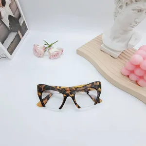 Stylish cat eye blue light blocking glasses featuring a trendy leopard print half frame.