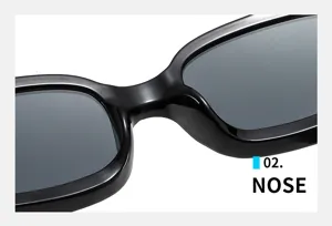 Schwarze Retro-Sonnenbrille Detailaufnahme mit glatter Steg und breiter Rahmenkonstruktion.