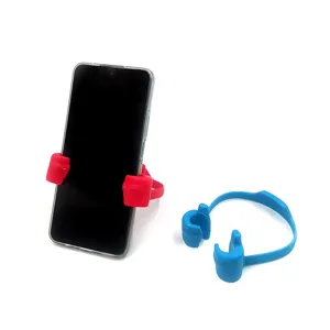 Thumb phone stand for desk, lazy phone holder support bracket in red and blue colors.
