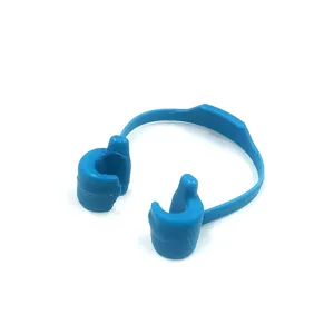 Blue plastic thumb mobile phone holder desktop lazy bracket for watching videos and online classes.