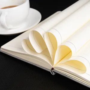 A5 business notebook with custom lined pages and stylish creative paper art display for office.