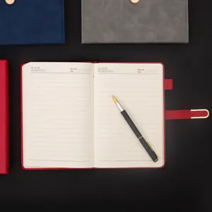 A5 business notebook gift set with hardcover leather journal and pen for office work.
