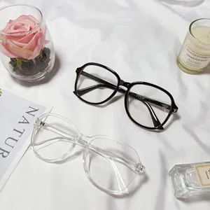 Fashion large frame clear glasses for women, stylish transparent and black optical frames.