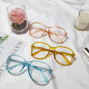 Fashionable clear flat-light glasses frames in pink, yellow, and blue for daily wear style.