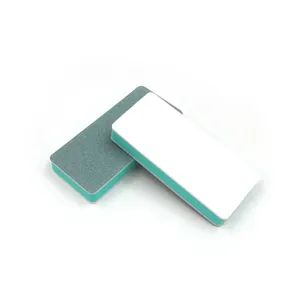 Close-up detail of double-sided sponge polishing block for jewelry and nail art.