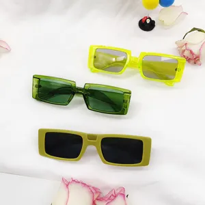 Trendy square sunglasses with yellow, green and matte avocado frames for stylish daily wear.