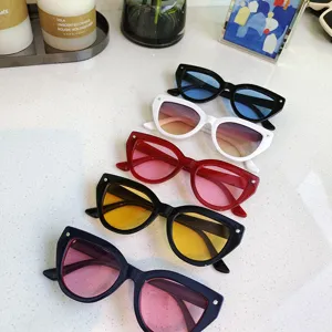 Trendy small frame cat eye sunglasses, stylish vintage street style UV400 sun protection eyewear.