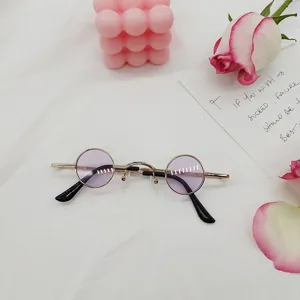 Vintage retro stroggylo gyali iliou me violet fakous kai metalliko plaisio twra.