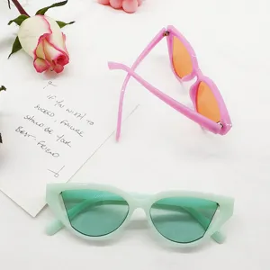 Retro cat-eye small frame sunglasses with colorful ocean lenses, trendy hip-hop style shades.