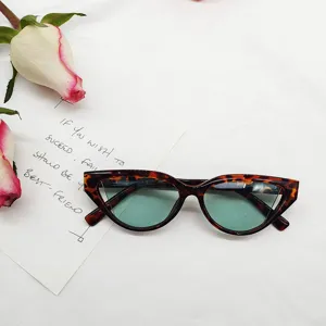 Retro cat-eye sunglasses with tortoise frame and gradient ocean lenses for women.