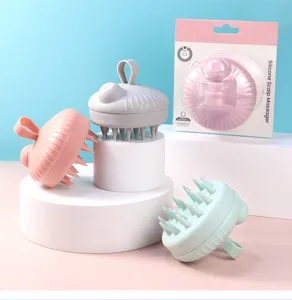 Silicone scalp massager shampoo brush with liquid dispenser handle for hair cleaning care.