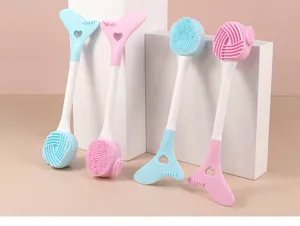 Silicone double-ended cleaning brush with soft bristles and ergonomic long handle for daily use.