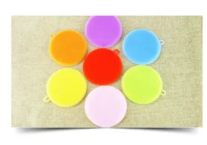 Colorful silicone dish cleaning brushes detail showing flexible texture and dense bristles.