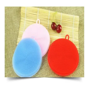 Multifunctional silicone dishwashing brush, round cleaning tool with hanging hole for kitchen.