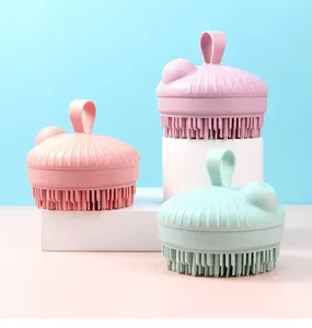 Detail shot of silicone shampoo brushes with liquid dispenser, ideal for scalp massage.