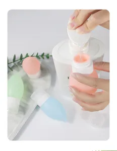 Portable silicone travel refillable squeeze bottles set for lotion, shampoo, soap.