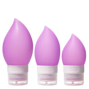 Portable silicone travel refillable bottles set in purple, ideal for shampoo and lotion.