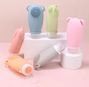 Silicone travel bottles set with facial cleansing brush, portable lotion and shampoo containers.