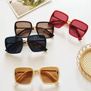 Oversized square sunglasses for women, fashionable gradient shades with UV400 protection.